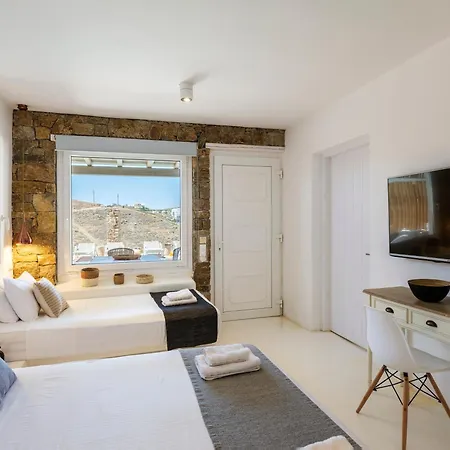 The Mykonist Merchia Beach Villas & Suites Exterior photo
